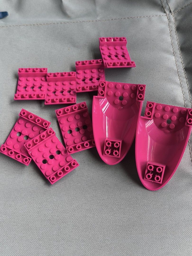 Pink LEGO Bricks and Curved Pieces (Category: Lego & Building Sets) located in Bacoor. Submitted by patrickpy063765 (Listing ID 1447007423, Image 1). Description: - Bundle of pink LEGO pieces - Includes several 2x4 plates - Features unique curved elements - Great for building or expanding your collection - Feel free to ask questions!.