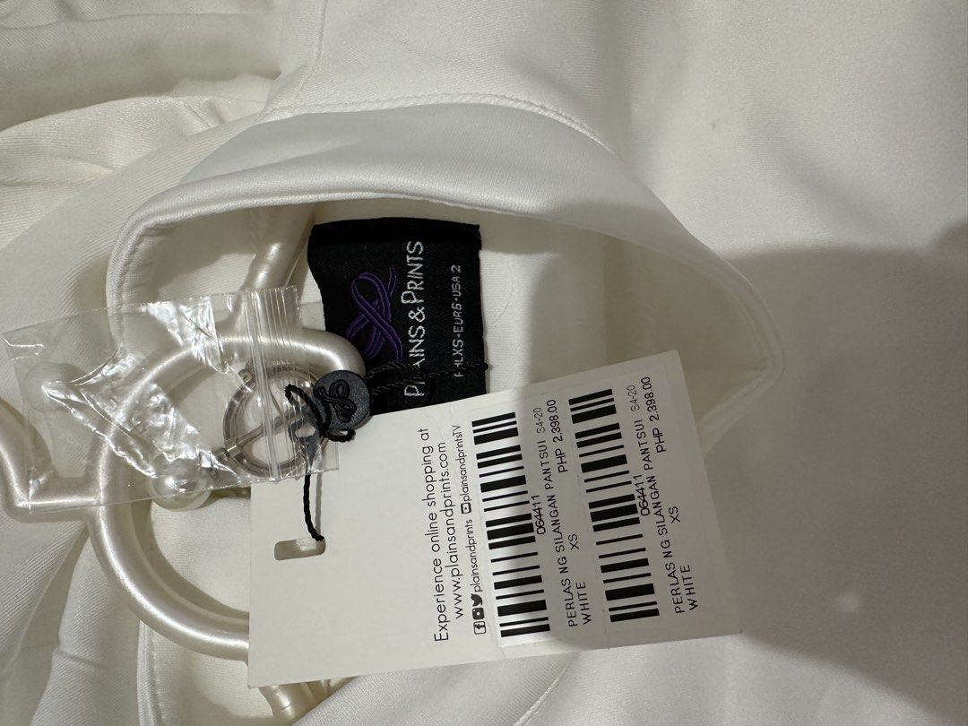 Plains & Prints Pamana Jumpsuit (white) (Category: Jumpsuits) located in Manila. Submitted by kptryl (Listing ID 1447015570, Image 3). Description: Has minor stains but I believe the stains can be removed by washing. Tag is still attached..