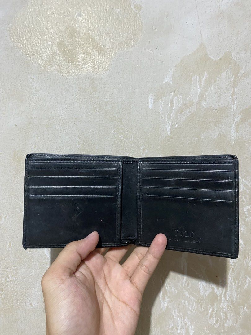 Polo Ralph Lauren Bear Bi-fold Wallet Black (Category: Wallets & Card holders) located in Manila. Submitted by nickoelmor72521 (Listing ID 1447022011, Image 3). Description: - Brand: Polo Ralph Lauren - Color: Black - Style: Bi-fold wallet - Material: Leather - Features: Iconic Polo Bear graphic on front, multiple card slots - Ideal for: Everyday use.