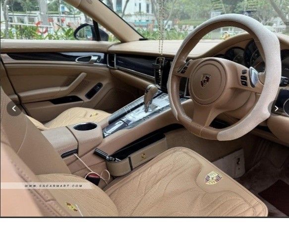 Porsche Panamera 3.6 PDK (A) (Category: Used Cars) located in Singapore. Submitted by leji.john (Listing ID 1446917661, Image 2). Description: Features Powered by 3.6L V6 engine producing 300bhp and 400nm torque, 7 speed PDK transmission, 0-100 in 6.3s, fuel consumption 10.8l/km, 80L fuel tank View specs of the Porsche Panamera (2009-2013) Accessories Electric memory seats, android player, powerlift tailgate, electric brake, multi function steeri