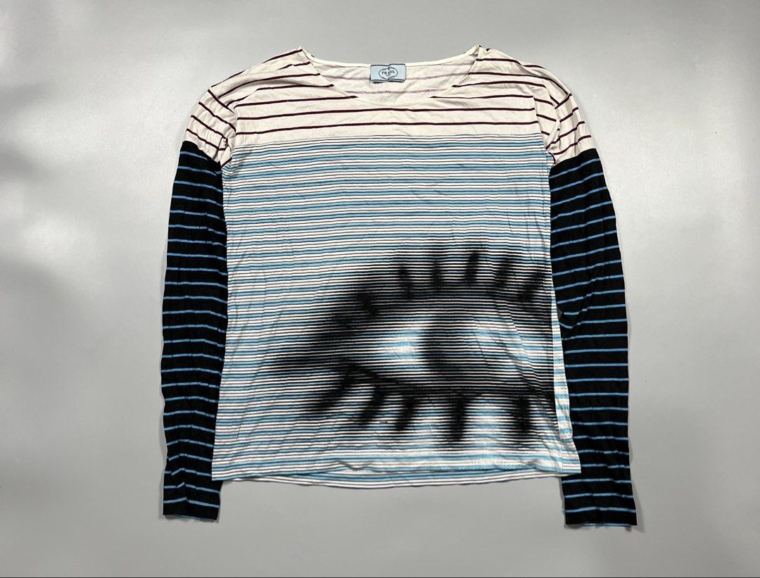 Prada - Multicolor Stripes Eye Print - Longsleeve (Category: Longsleeves) located in Taguig. Submitted by chicpicked (Listing ID 1447083179, Image 1). Description: Prada - Multicolor Stripes Eye Print - Longsleeve Worn by Tess Van De Berg on The L World Generation Q movie Authentic Excellent condition Caretag is cut but still intact Fits like medium imo 500.