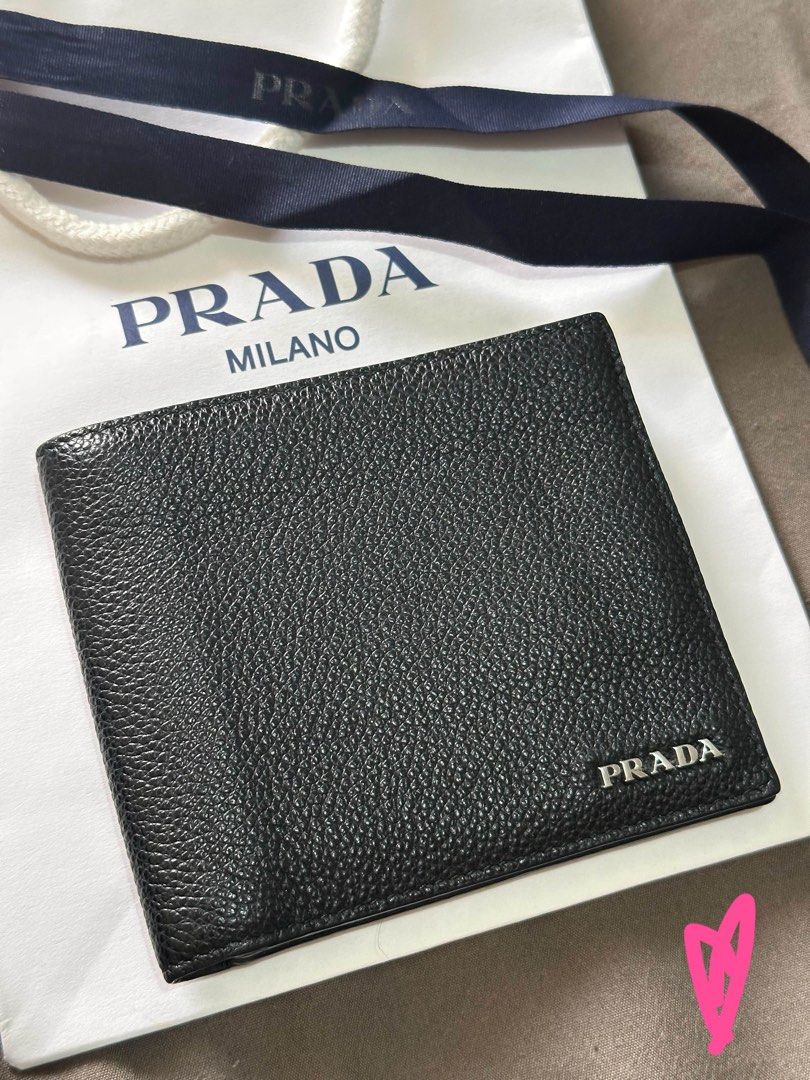 Prada Black Leather Bifold Wallet Mens (Category: Luxury Bags & Wallets) located in Manila. Submitted by hepburnbeautyph (Listing ID 1447019904, Image 1). Description: Great Gift for Your Dad or Husband 💕 🖤 Prada Portafoglio Orizzontale Bi-fold Wallet for Men - All Black - Grain Nero Authentic | Complete | Like Brand New Bought from Prada Outlet Shanghai 🇨🇳 ✅ Only 3 months old — used twice, then stored properly ✅ Complete with Box, Receipt & 