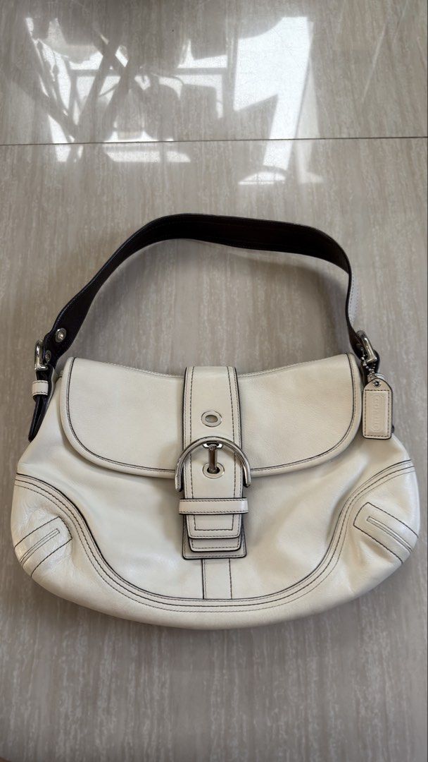 Preloved authentic vintage coach bag (Category: Shoulder Bags) located in San Pedro. Submitted by rfvpm (Listing ID 1446916490, Image 1). Description: Preloved large authentic contage coach shoulder bag. Clean interior. With signs of color transfer in the back part of the bag. No orher inclusion. P5000 plus shipping via jnt. .