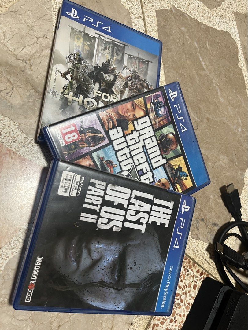 PS4 Slim 1tb Console with 2 Controllers and 3 Games (Category: PlayStation) located in Manila. Submitted by layyz_ (Listing ID 1447019968, Image 2). Description: selling my ps4 1tb rfs: di na nagagamit Inclusions: - original ps4 box - power cable - hdmi cable - 2 dualshock controllers (1 original) - 3 games (The last of us 2, Gta V, For honor) lightly used .