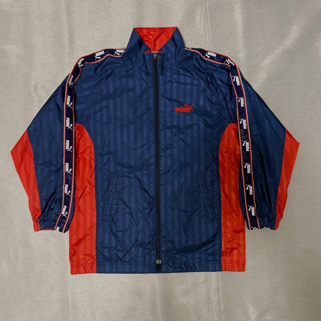 Puma Track Jacket Navy Red Striped (Category: Coats, Jackets and Outerwear) located in Naic. Submitted by pompompvrin (Listing ID 1447075315, Image 1). Description: 46W × 61L cm.