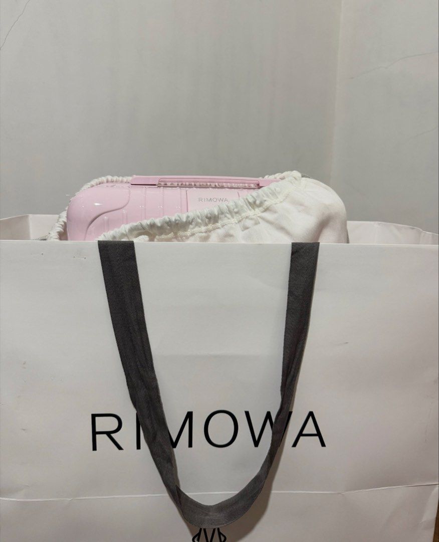 Rimowa Pink Cabin Suitcase (Category: Luggage) located in Quezon City. Submitted by minimalistmom7 (Listing ID 1446947381, Image 1). Description: - Pink Rimowa cabin size suitcase - Comes with original dust bag - Includes Rimowa shopping bag - Ideal for short trips - Feel free to ask any questions.