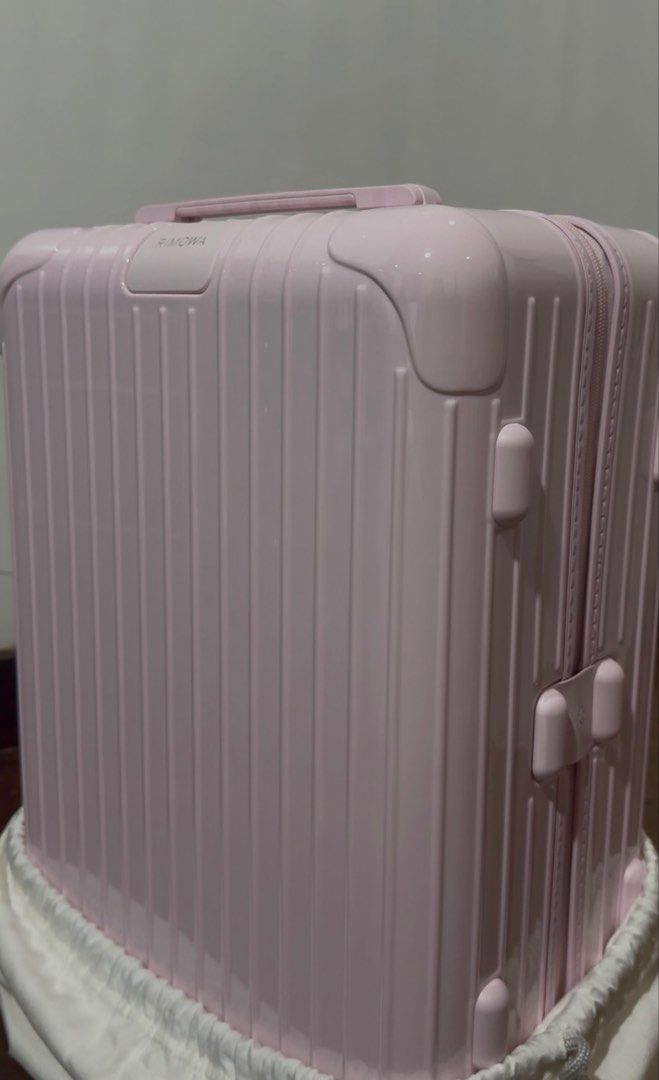 Rimowa Pink Cabin Suitcase (Category: Luggage) located in Quezon City. Submitted by minimalistmom7 (Listing ID 1446947381, Image 2). Description: - Pink Rimowa cabin size suitcase - Comes with original dust bag - Includes Rimowa shopping bag - Ideal for short trips - Feel free to ask any questions.