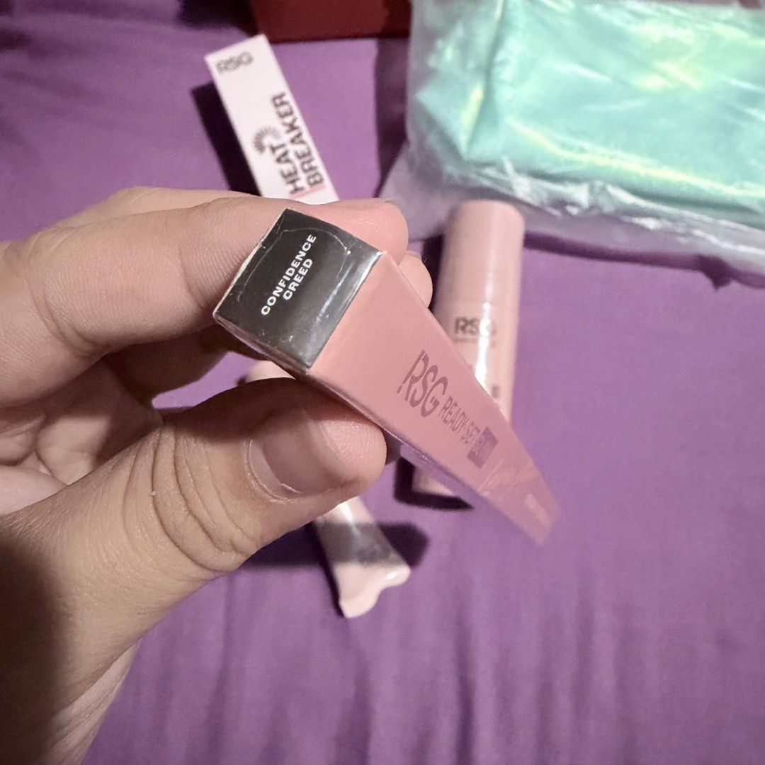 RSG Ready Set Glow Beauty Gift Set (Category: Face Care) located in Manila. Submitted by n_a_c (Listing ID 1446949814, Image 3). Description: - Complete RSG Ready-Set-Glow beauty set - Includes Badass Face & Body Mist - Heat Breaker Matte Serum Sunscreen SPF 50 - Statement Better Brow Duo - Comes with a cute iridescent makeup pouch - All items are authentic RSG products - Ideal for your skincare and makeup needs.