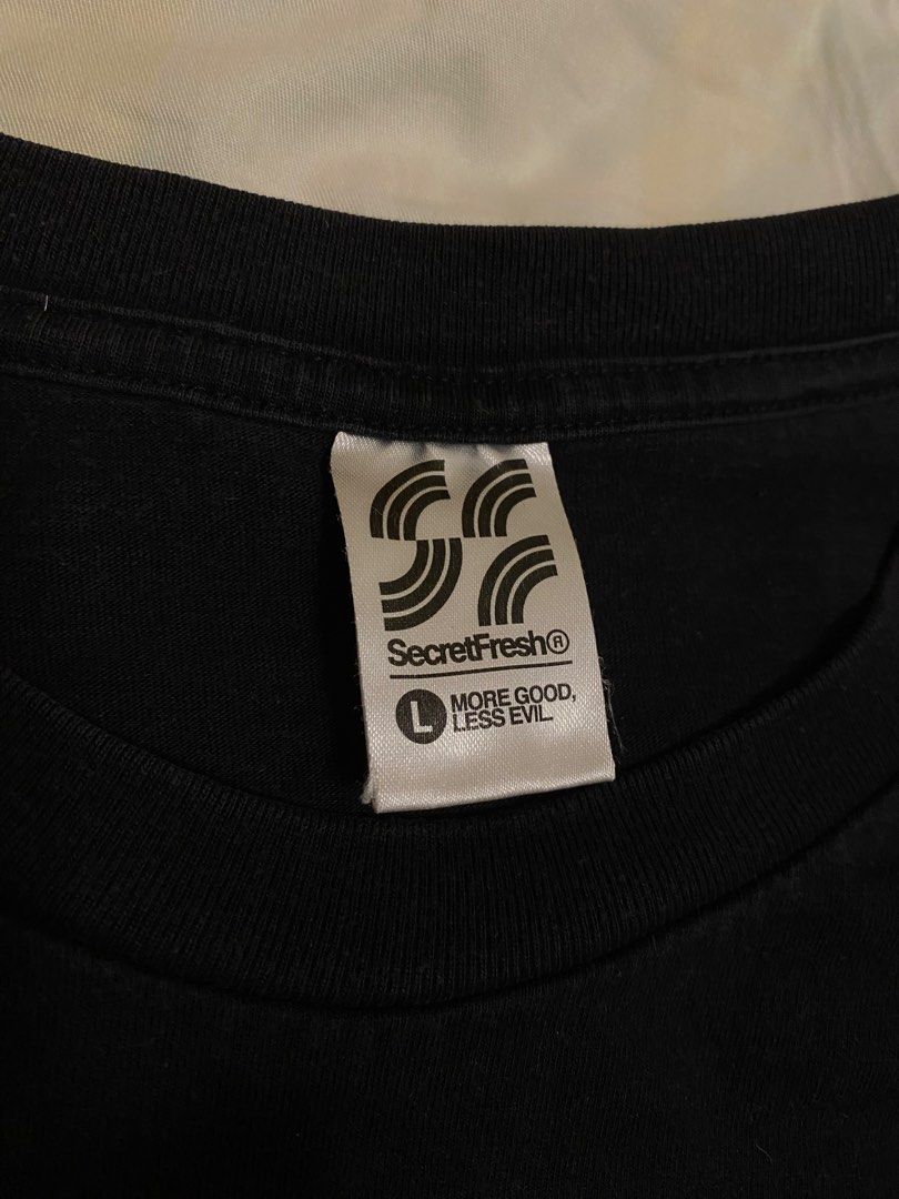 Secret Fresh Graphic Black Tee (Category: Tshirts & Polo Shirts ) located in Taguig. Submitted by ayo.pie (Listing ID 1447022369, Image 3). Description: - Secret Fresh Graphic Tee (Second hand) - Black “Good Times Here” - L / EU 52 / UK 42 / US 42 RFS: Decluttering Original price: ₱1,300 Selling for: ₱500 (negotiable) - Authentic - Condition: Like new, No fading, no damage - Front Design: Purple cat graphic with ‘Secret Fresh’ text - Back Design: