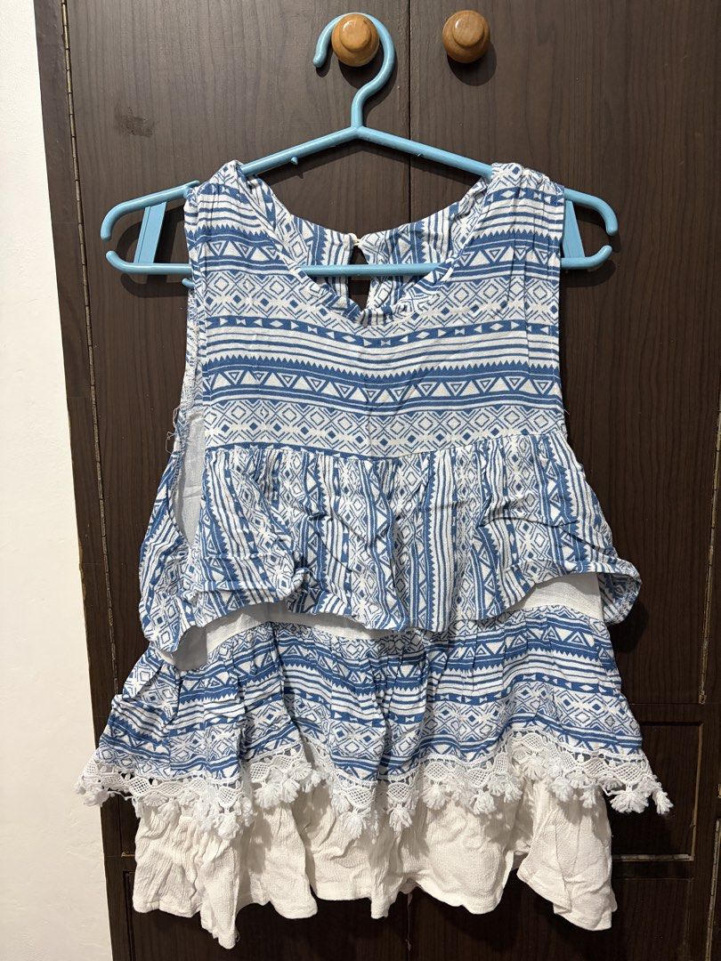 Sleeveless Boho Peplum Beach Top (Category: Sleeveless) located in Taguig. Submitted by won_eeee (Listing ID 1447099811, Image 1). Description: - Size small to medium - Sleeveless - Convenient keyhole closure at the back - Ideal for casual outings or beach vacations.