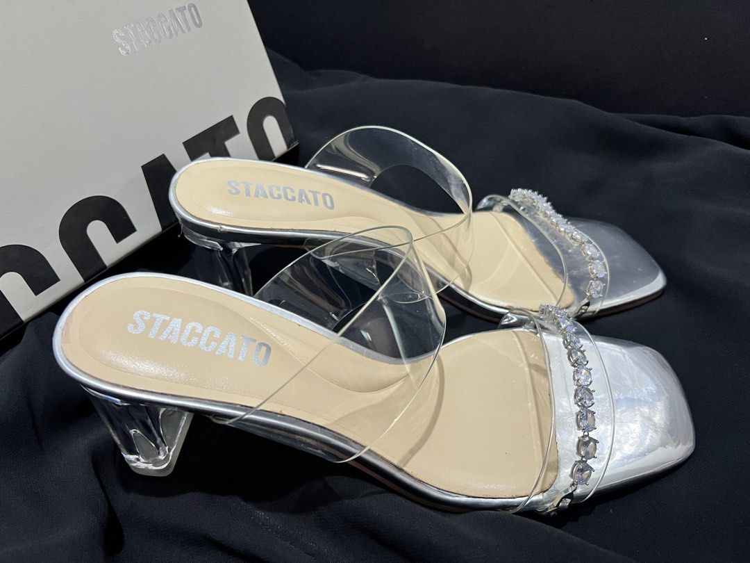 Staccato Silver Square Toe Embellished Heels Size 38 (Category: Heels) located in Las Pinas. Submitted by sabsking (Listing ID 1446995666, Image 3). Description: - BRAND NEW Elegant silver stiletto heels - Clear straps adorned with dazzling rhinestones - Trendy square toe design - Comfortable block heel - Size: 38 - Includes original box Orig price ₱5999 Selling ₱3500 plus sf Free brand new close shoe heels not branded .