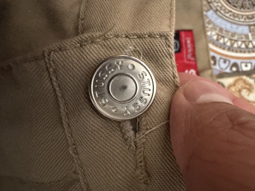 Stussy Work Pants Size 30 Khaki (Category: Jeans) located in Bacolod City. Submitted by darweenj (Listing ID 1446930669, Image 3). Description: - Stussy Khaki Work Pants - Size: 30 - Material: 60% Polyester, 40% Cotton - Closure: Button fly - Details: Stussy logo on button, Stussy NY/LA tag - Care: Wash dark colors separately - Ideal for: Everyday wear.