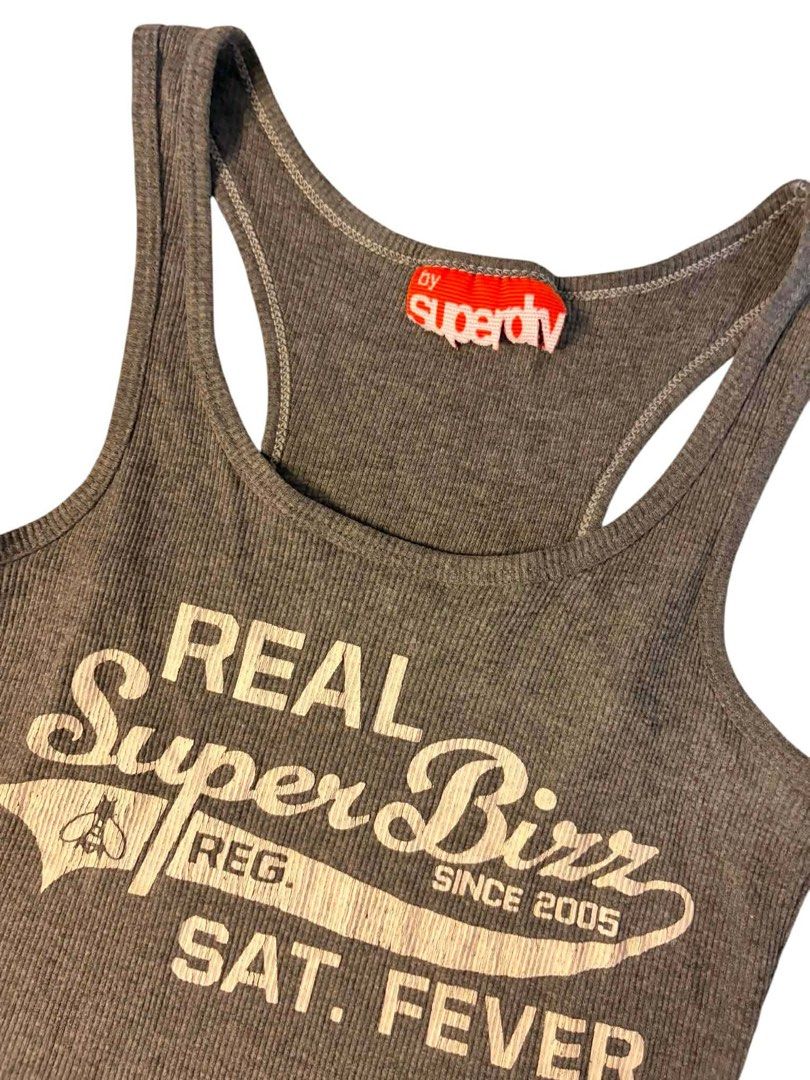 Superdry Grey Ribbed Racerback Tank Top (Category: Sleeveless) located in Baguio. Submitted by gabriyelo (Listing ID 1447054842, Image 2). Description: - Grey Superdry tank top - Ribbed material - Racerback design - 'Real Super Birr Sat. Fever' graphic print on front - Comfortable and casual for everyday wear.