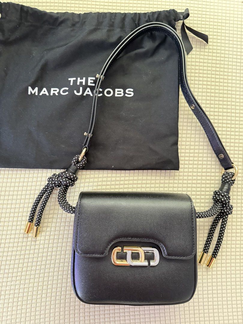 The Marc Jacobs Black Leather Snapshot Camera Bag (Category: Luxury Bags & Wallets) located in Paranaque City. Submitted by balofies (Listing ID 1446978790, Image 1). Description: The Marc Jacobs Snapshot Camera Bag 🖤 Used only twice and stored properly, so it’s in excellent condition. Crafted from black pebbled leather with the signature Marc Jacobs hardware. Features a unique adjustable shoulder strap with cute polka-dot knotted details. The b