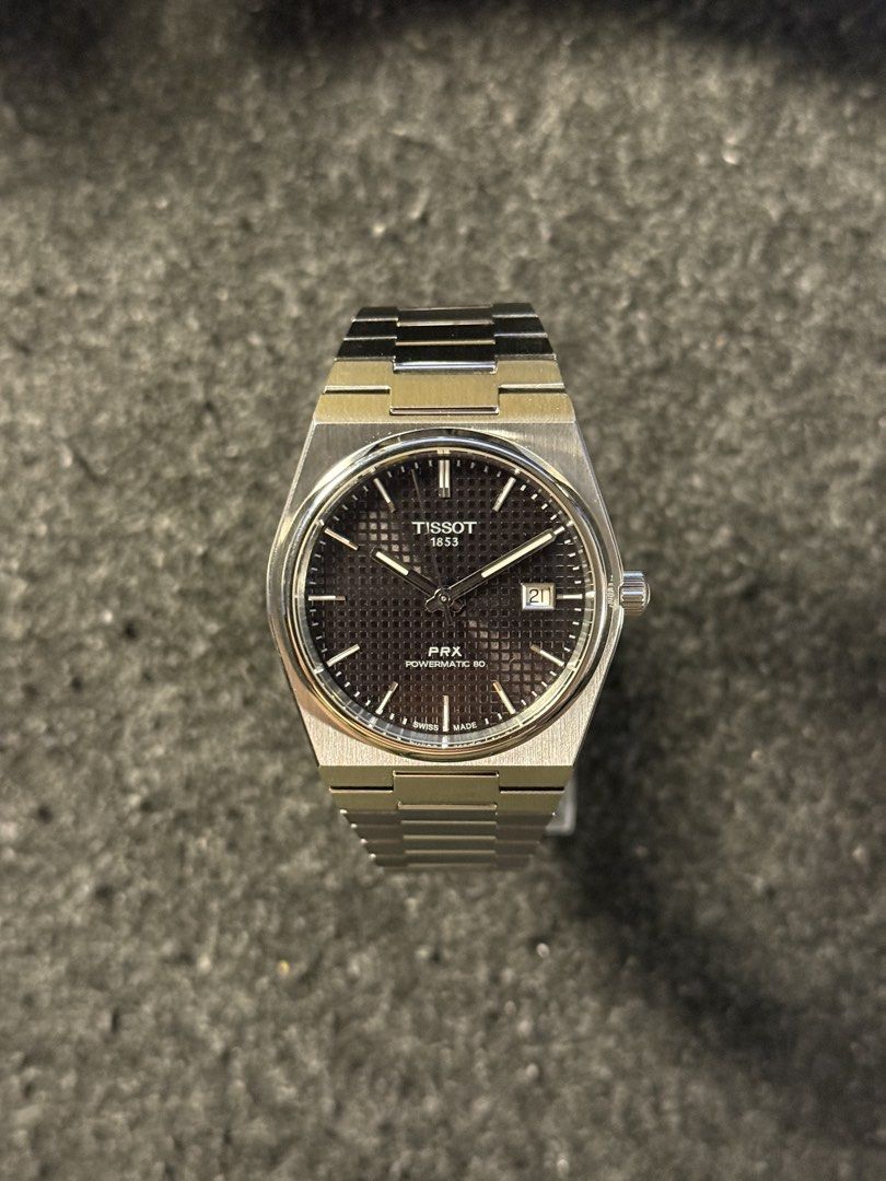 Tissot PRX Powermatic 80 Black (Category: Luxury Watches) located in Las Pinas. Submitted by amazingjeffrey (Listing ID 1447043959, Image 2). Description: Tissot PRX Powermatic 80 40mm Black Dial 9.5/10 condition, good as new! Comes with box, box sleeve, manual, card, complete links. 27k only! (SRP is now @ 55k) repriced! Biñan/Sta.Rosa.