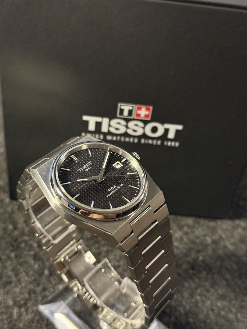 Tissot PRX Powermatic 80 Black (Category: Luxury Watches) located in Las Pinas. Submitted by amazingjeffrey (Listing ID 1447043959, Image 3). Description: Tissot PRX Powermatic 80 40mm Black Dial 9.5/10 condition, good as new! Comes with box, box sleeve, manual, card, complete links. 27k only! (SRP is now @ 55k) repriced! Biñan/Sta.Rosa.