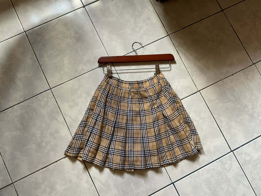 ASPACK Two Skirts: Plaid Pleated and Psychedelic Print Mini (Category: Skirts) located in Rosario. Submitted by tocus (Listing ID 1446966422, Image 3). Description: SHEIN SHIRTS - Tan plaid pleated skirt with detachable waist belt. - Fun pink, yellow, and white wavy print mini skirt. - Versatile pieces for casual outings or dressing up. - Unique additions to your wardrobe. - Grab them now!.