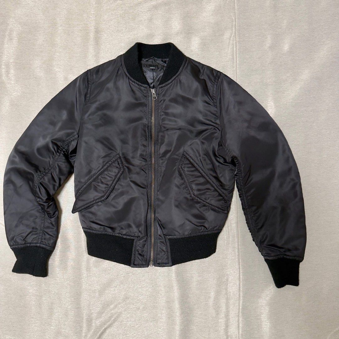Uniqlo Black Bomber Jacket (Category: Coats, Jackets and Outerwear) located in Naic. Submitted by pompompvrin (Listing ID 1447075818, Image 1). Description: S on tag / 46W × 54L cm.