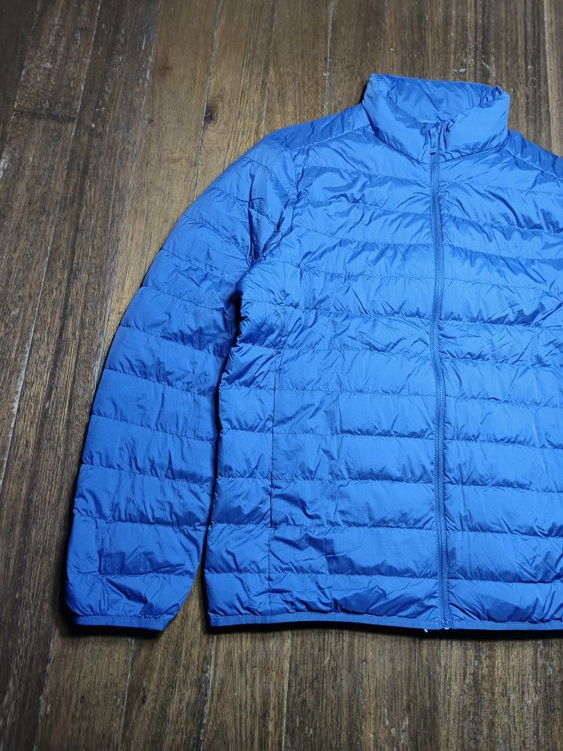 Uniqlo Lightweight Down Jacket Size L mens (Category: Coats, Jackets and Outerwear) located in Mandaluyong City. Submitted by heatgear (Listing ID 1447032612, Image 2). Description: missing pouch - Uniqlo Ultra Light Down Jacket - Color: Vibrant Blue - Size: Large (L) - Features water repellency - Ideal for layering or standalone wear - Packs down small for easy storage - Perfect for travel and everyday use - Made in China chest 96-104 cm height 