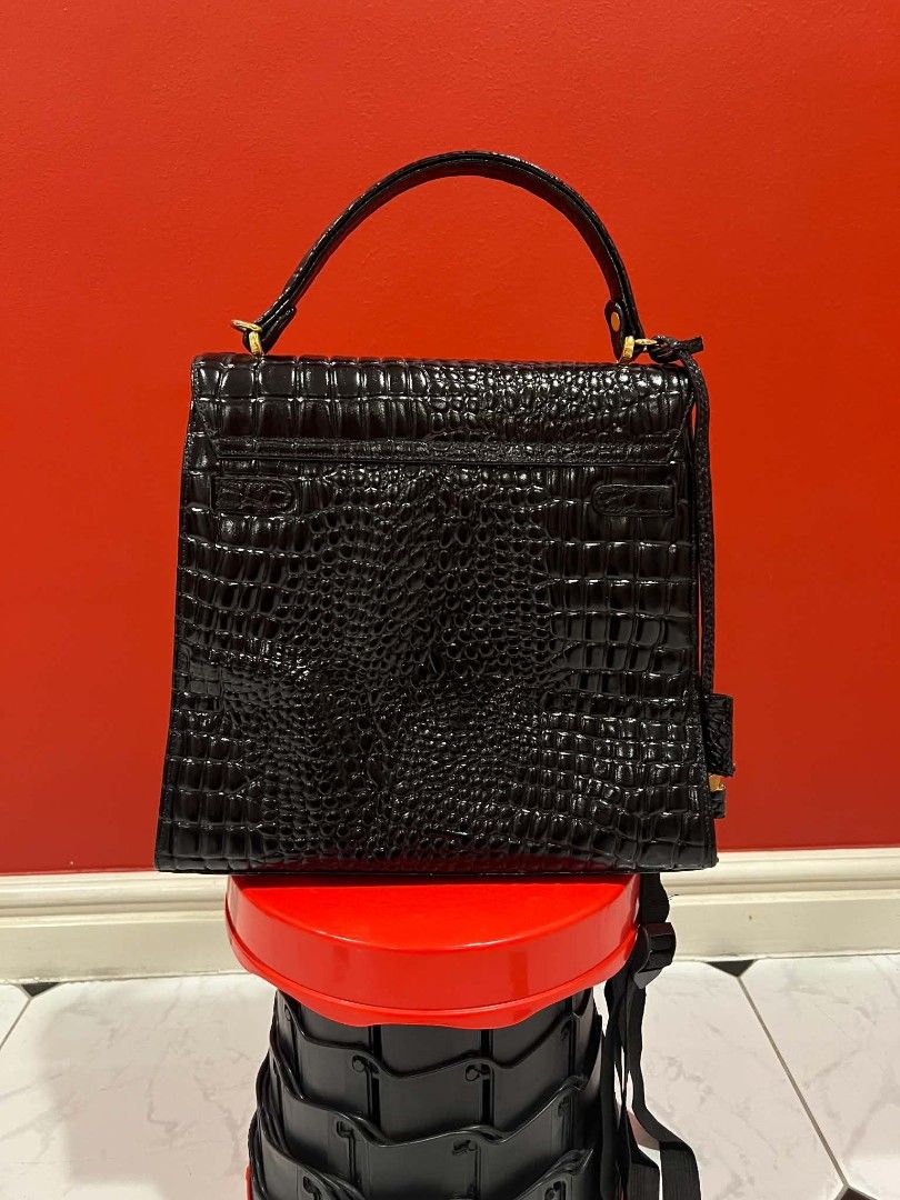 Valentino Marudini (Category: Luxury Bags & Wallets) located in Cainta. Submitted by up_for_second_chance (Listing ID 1447063003, Image 3). Description: Measurements Height: 26.5 cm Length: 29.2 cm Width: 11 cm Handle Drop: 10 cm Has lock and key Missing shoulder strap Exterior is in excellent condition Interior has signs of use (difficult to capture with the camera).