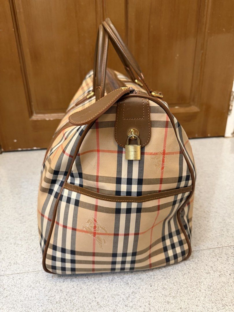 Vintage Burberry Duffle Bag (Category: Luxury Bags & Wallets) located in Bulacan. Submitted by jen_evang06 (Listing ID 1447055325, Image 3). Description: - Vintage Burberry duffle bag - Bought in Japan - Iconic Nova Check pattern - Genuine leather trim and handles - Lightweight .