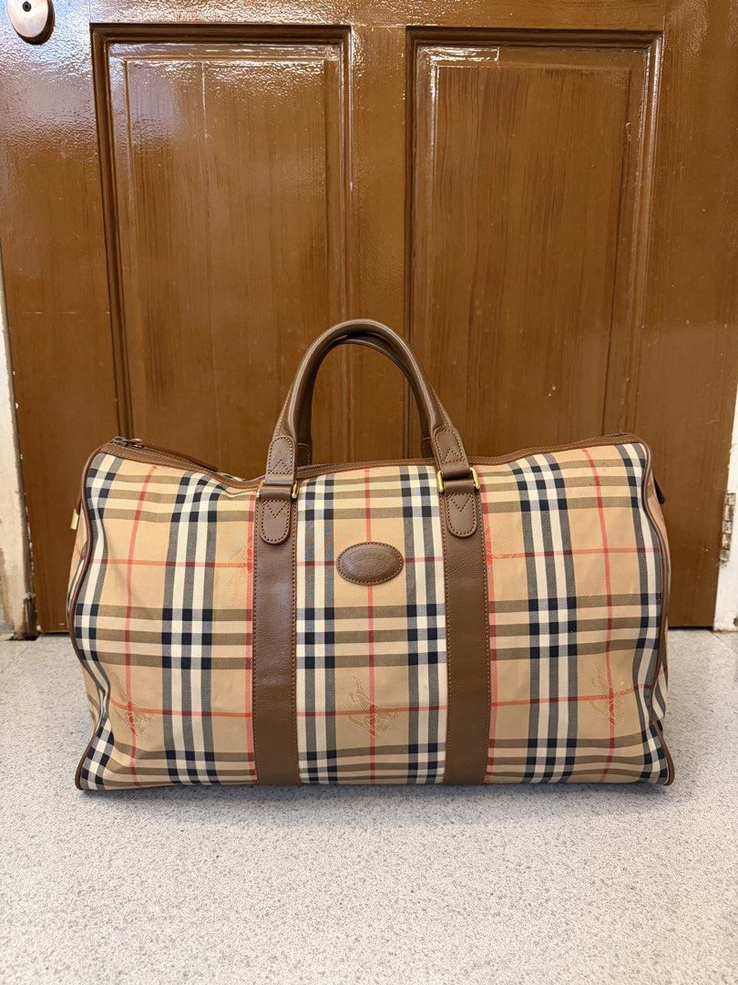 Vintage Burberry Duffle Bag (Category: Luxury Bags & Wallets) located in Bulacan. Submitted by jen_evang06 (Listing ID 1447055325, Image 1). Description: - Vintage Burberry duffle bag - Bought in Japan - Iconic Nova Check pattern - Genuine leather trim and handles - Lightweight .