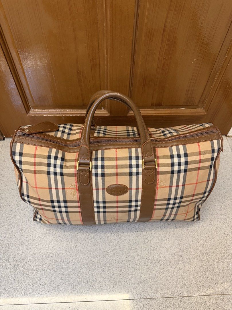 Vintage Burberry Duffle Bag (Category: Luxury Bags & Wallets) located in Bulacan. Submitted by jen_evang06 (Listing ID 1447055325, Image 2). Description: - Vintage Burberry duffle bag - Bought in Japan - Iconic Nova Check pattern - Genuine leather trim and handles - Lightweight .