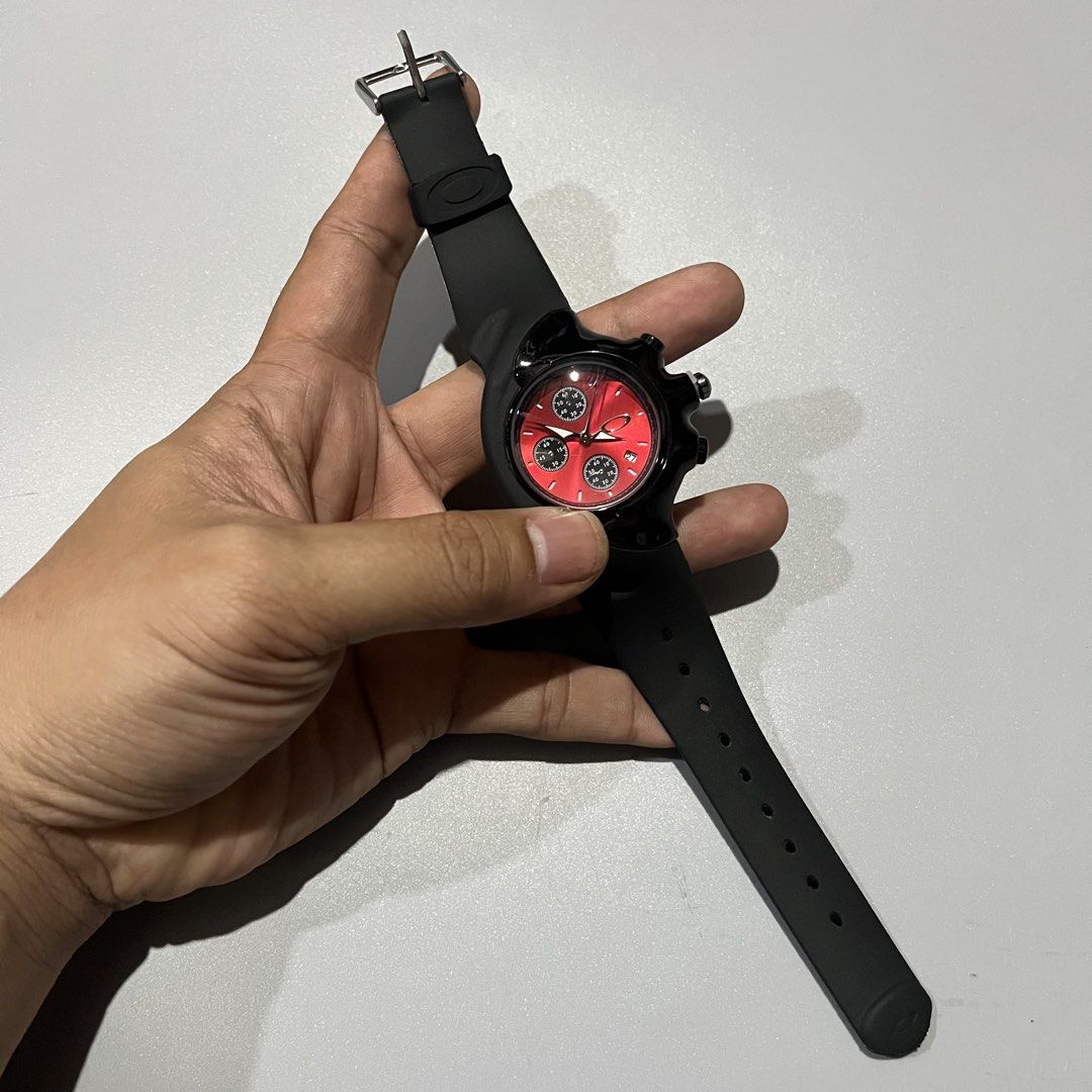 VTG OAKLEY DETONATOR WATCH (RED DIAL) (Category: Luxury Watches) located in Manila. Submitted by tnerb_buynsell1 (Listing ID 1447085802, Image 2). Description: VTG OAKLEY DETONATOR WATCH (RED DIAL) striking red dial and a black silicone strap.