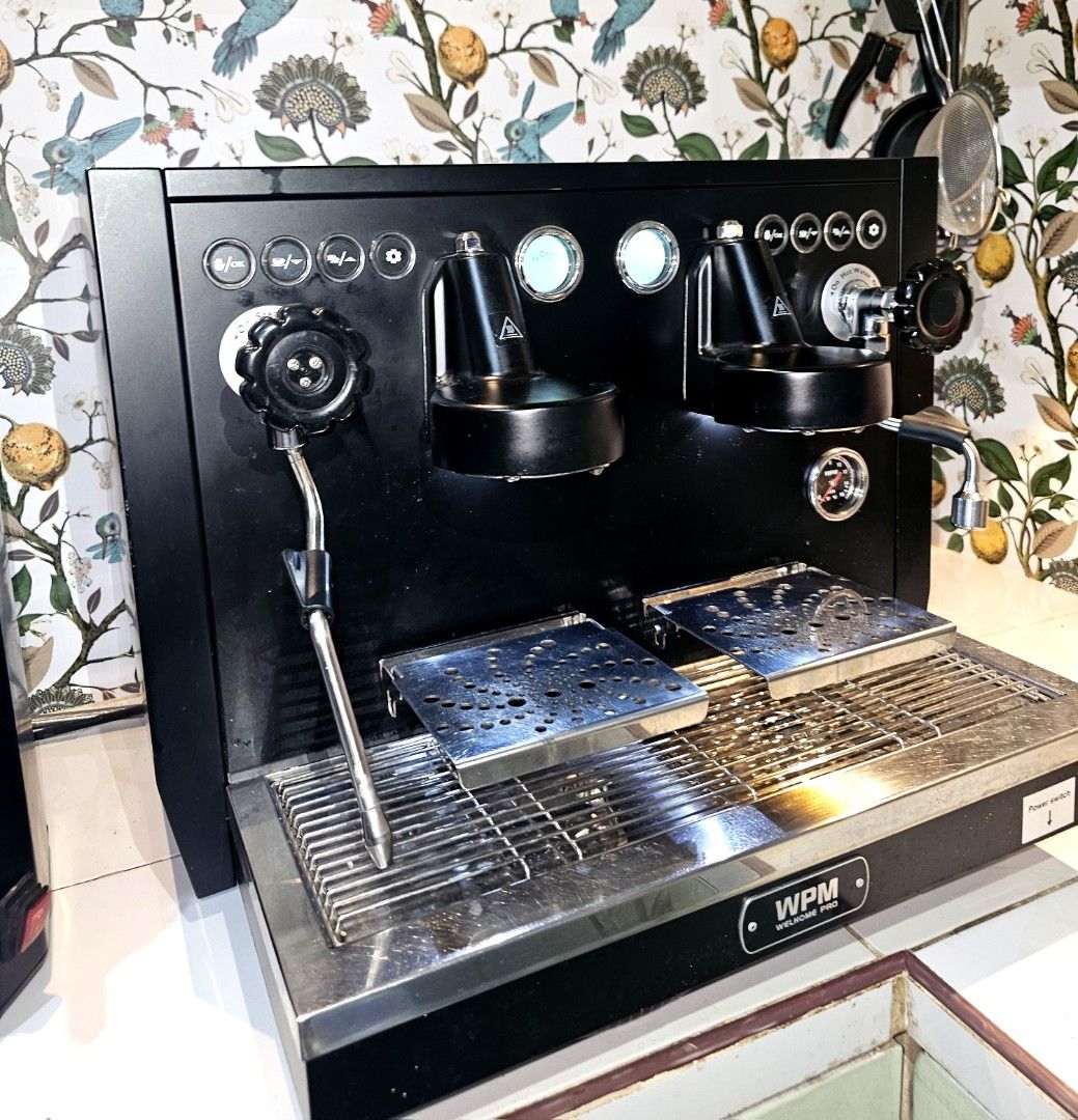 WPM Espresso Machine and Grinder Set (Category: Coffee Machines & Makers) located in Manila. Submitted by kcobach56626 (Listing ID 1447054533, Image 2). Description: - WPM Espresso Machine (Black) - Two Group Heads - Steam Wand - WPM Grinder (Black) - Digital Display - Ideal for coffee lovers - Ready for a new home This well loved coffee machine has been carefully maintained and is in excellent working condition. Feel free to inspect and test it 