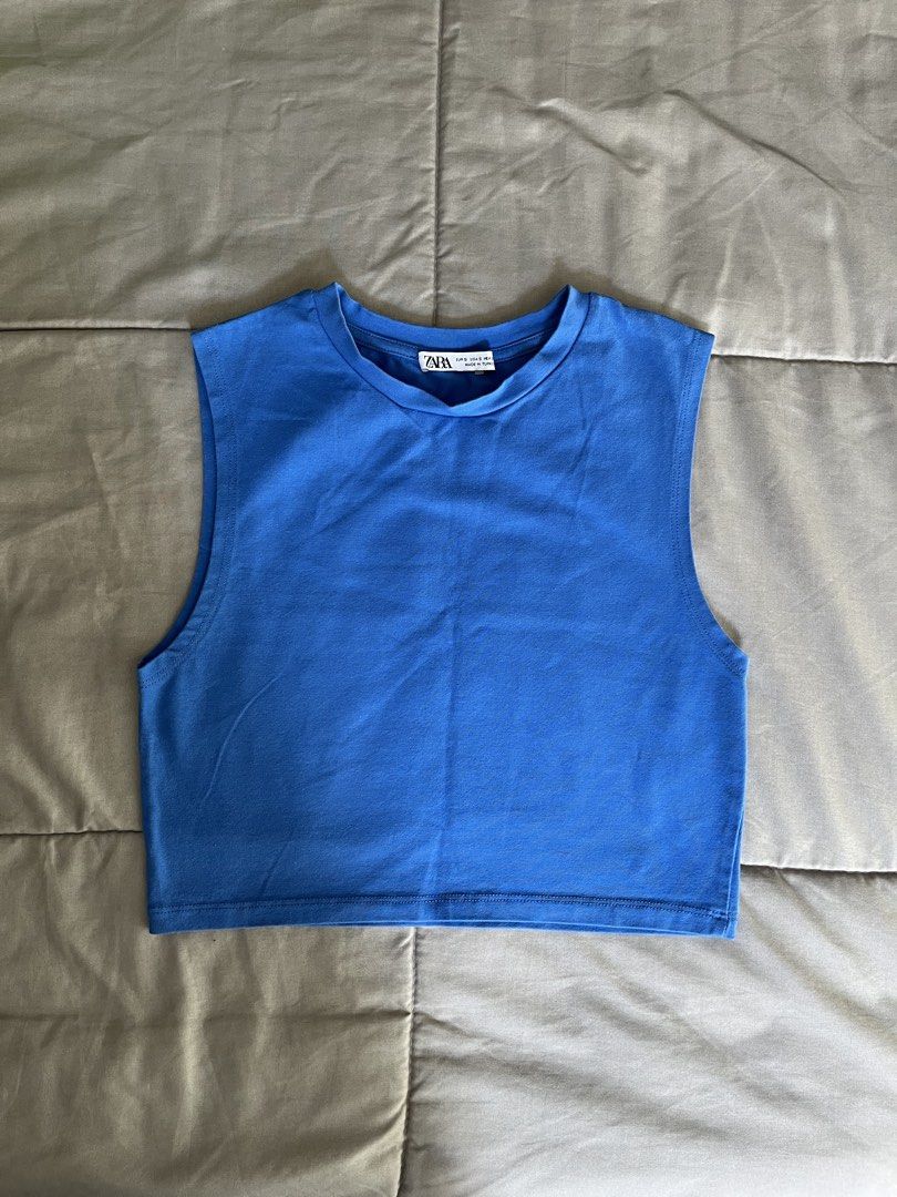 Zara Blue Sleeveless Cropped Top (Category: Sleeveless) located in Mandaluyong City. Submitted by sofieshops (Listing ID 1446939090, Image 1). Description: Brand: Zara Size: S Details: Blue cropped tank top RFS: Not my style anymore Delivery: Gogoxpress or Grab Last price posted. DM for when worn and other questions 🤎.