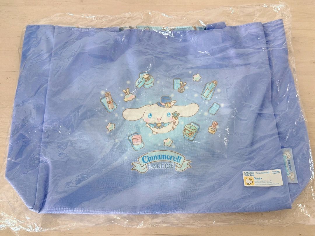 100% AUTHENTIC 100% NEW SANRIO X LANEIGE Cinnamoroll Blue Tote Bag 全新未拆封兰芝×玉桂狗联名托特包 三丽鸥Cinnamoroll双面印花手提袋 (Category: Tote Bags) located in Kuala Lumpur. Submitted by chungfs (Listing ID 1448751250, Image 1). Description: *100% AUTHENTIC 100% NEW *Manufactured by LANEIGE *Under the License of SANRIO WAVE HONG KONG - Brand: Laneige X Sanrio - Cute blue tote bag featuring Cinnamoroll and little bottle designs. - Adorable Cinnamoroll graphic on the f