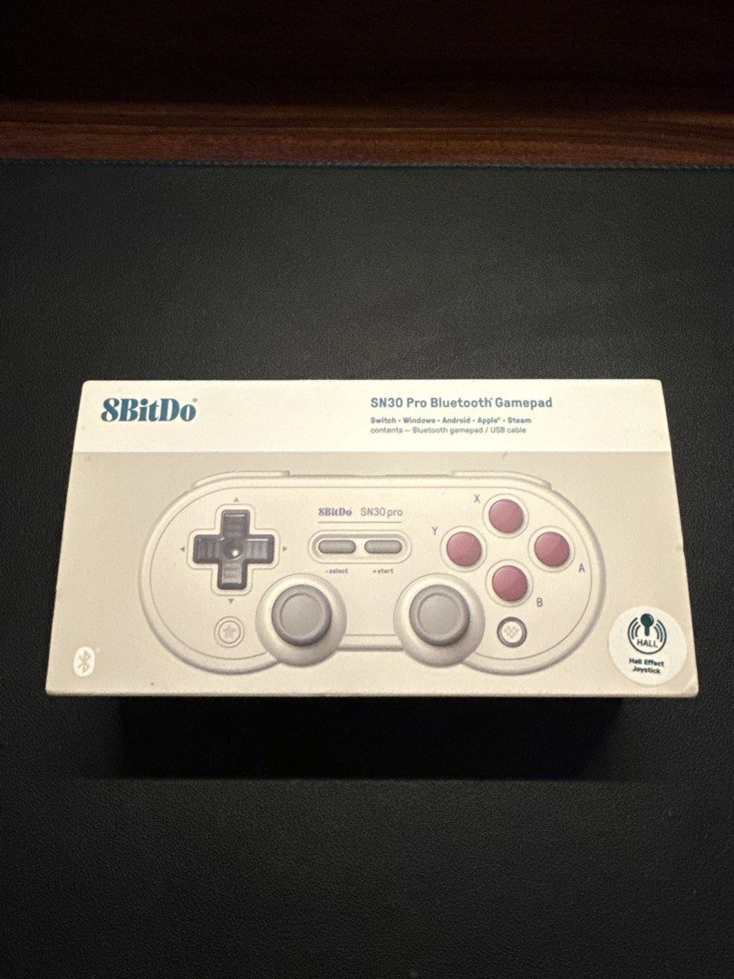8BitDo SN30 Pro Controller (Category: Controllers) located in Singapore. Submitted by sharillll (Listing ID 1448829592, Image 1). Description: Retro colorway, with box cables and Skull&Co thumbstick protector. Buy with other controllers for discount, self collect.