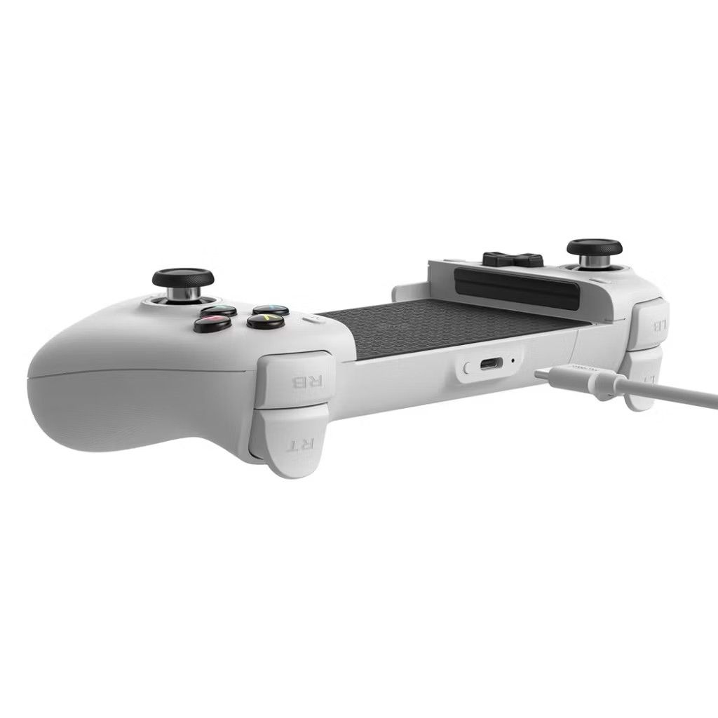 8BitDo Ultimate Mobile Gaming Controller (Category: Controllers) located in Singapore. Submitted by zaileywu (Listing ID 1443439668, Image 3). Description: Selling as no time to play games Condition as good as new Comes with full box Colour: Black Battery Type / Battery Life: 300mAh Li-on battery, rechargeable 13 play hours with 1.5 hours charging time Special Features: Hall Effect triggers and joysticks 2 Pro back paddle buttons Tactile bumpers 