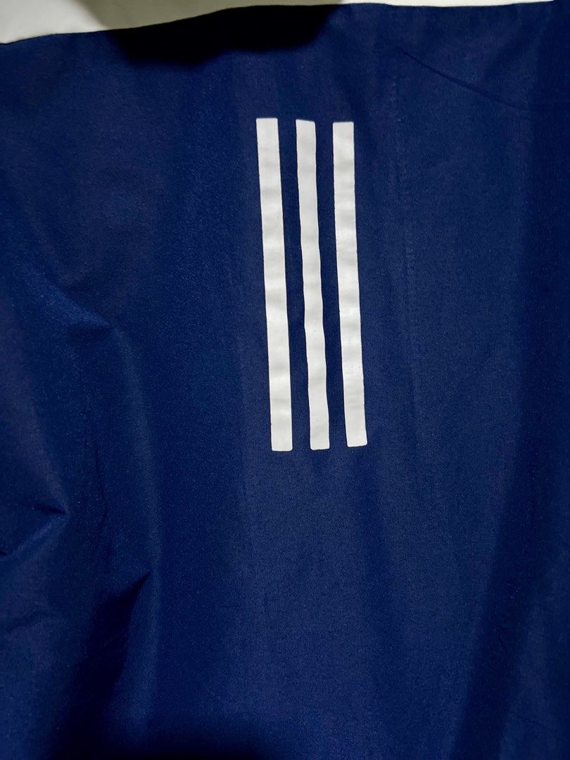 Adidas Windbreaker Jacket Navy Blue White Blue (Category: Coats, Jackets and Outerwear) located in Manila. Submitted by dos05 (Listing ID 1448828991, Image 3). Description: Good as new No issues Waterproof material - Classic Adidas windbreaker jacket - Iconic three stripes on the back - Navy blue with white and royal blue accents - Features a hood Width 20 Length 28 Qc area Shipping via grab or lalamove Give your best offer .