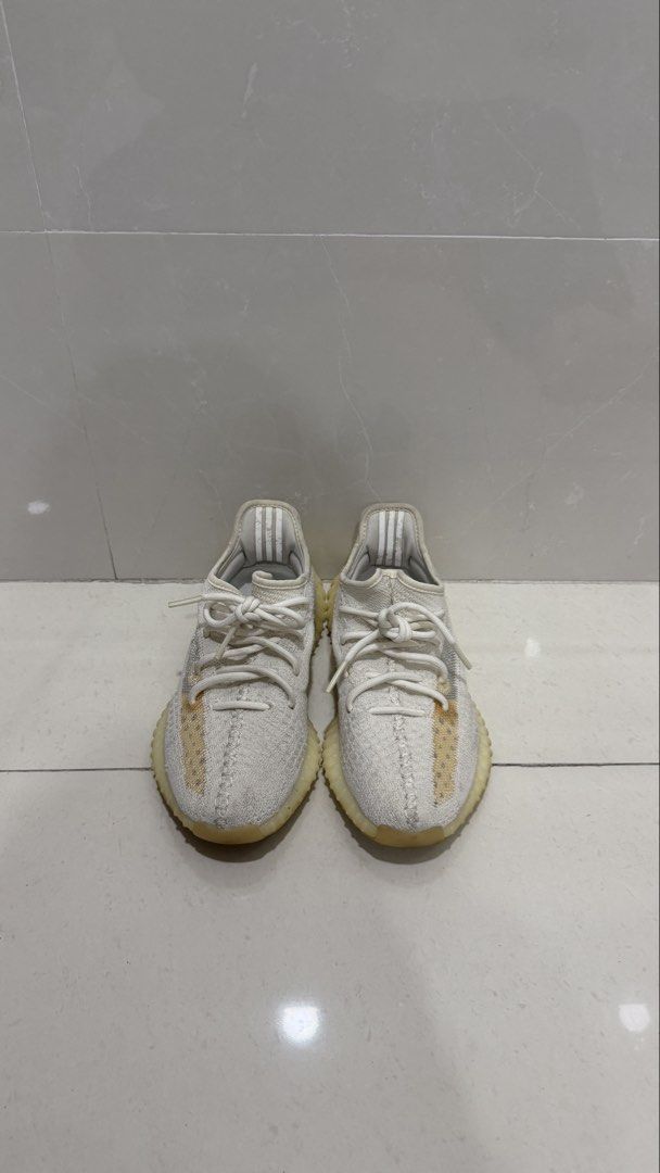 Adidas Yeezy Boost 350 V2 Cream White (Category: Sneakers) located in Manila. Submitted by lilac.z (Listing ID 1448786086, Image 3). Description: - Adidas Yeezy Boost 350 V2 in Cream White - Features classic knit upper with signature translucent stripe - Equipped with comfortable BOOST cushioning - Soles show some wear but retain plenty of life - Ideal for everyday wear - fits size 37.