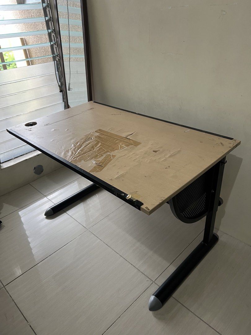 Adjustable Drafting Table Art Desk (Category: Tables & Sets) located in Cebu City. Submitted by rap.declutter (Listing ID 1448795706, Image 2). Description: RFS: moving out - Adjustable drafting table, perfect for drawing, sketching, and art projects. - Surface tilts to multiple angles for comfortable use. - Sturdy legs ensure excellent support and stability. INCLUDES: 5 backing papers (cartolina) 9 tracing papers 2 rotring paper cases 3 t square