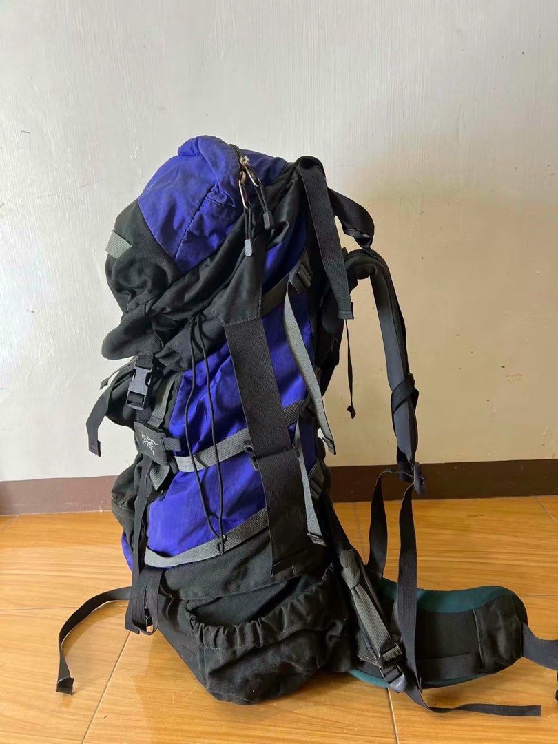 Arc'teryx Bora 95 Backpack (Category: Backpacks) located in Manila. Submitted by randomstuffiselltofundmyshit (Listing ID 1448835903, Image 2). Description: - Arc'teryx Bora 95 backpack - Large capacity for multi-day trips - Multiple compartments and straps for gear - Adjustable harness for comfort - Blue and black colorway - Ideal for hiking and camping.