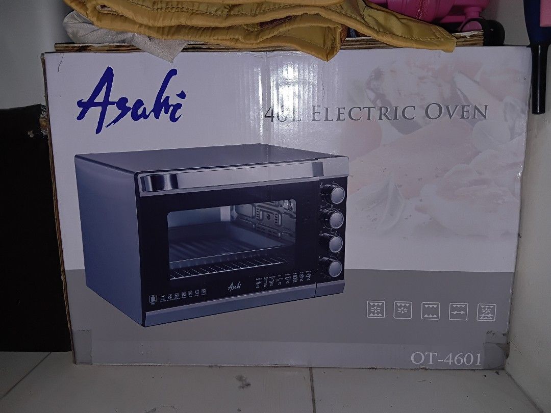 Asahi 46L Electric Oven OT-4601 (Category: Ovens & Toasters) located in Pasay City. Submitted by pristinepages (Listing ID 1448773400, Image 2). Description: - Asahi 46L Electric Oven - Model: OT-4601 Convection and Rotisserie Oven 46-Lter capacity 2,000W 120-minute timer with bell Individual temperature control for upper and lower heating element With indicator light With stay-on function Stainless steel body and handle 4 metal heating tubes Non