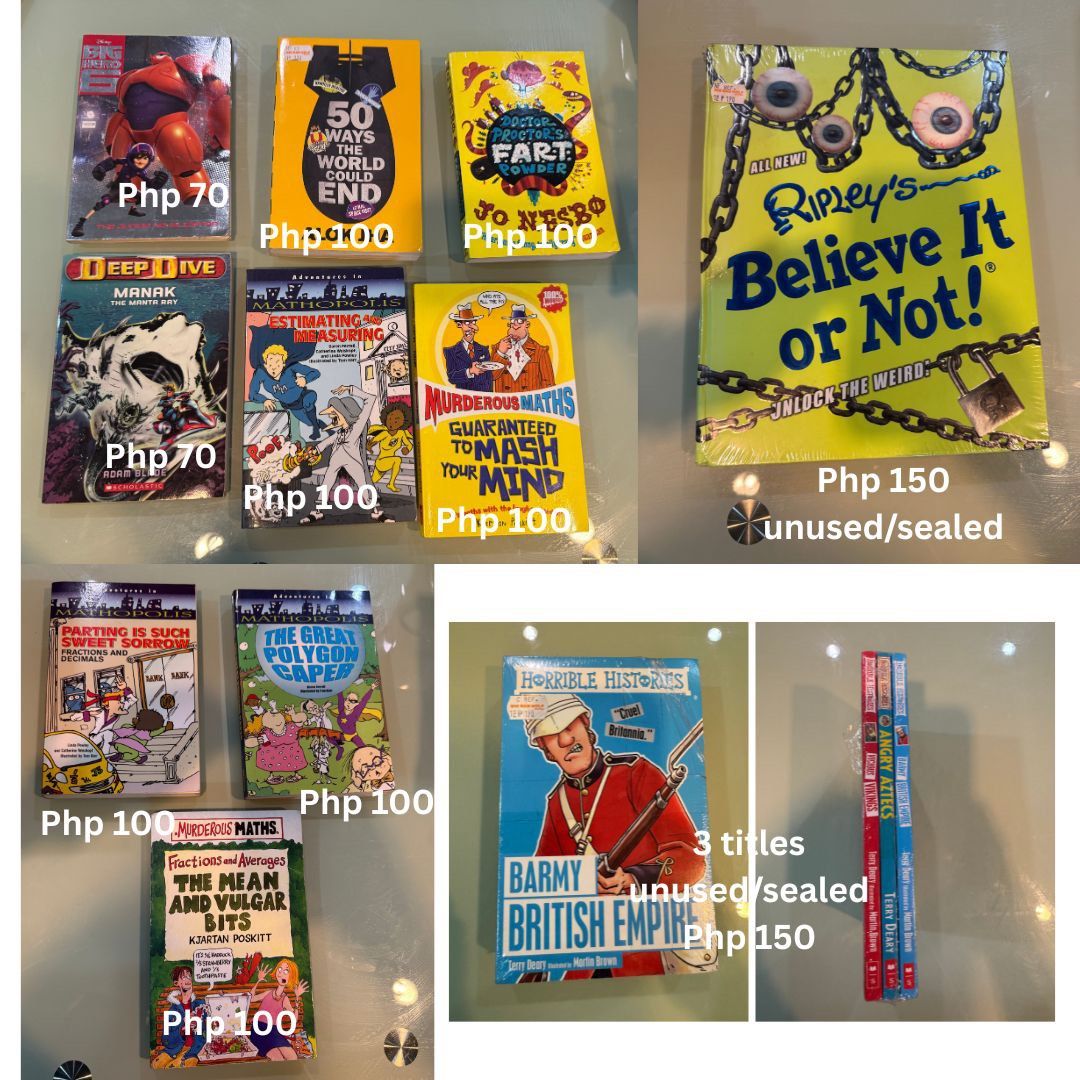 Assorted Books - Knowledge, Fiction, Almanacs, and More (Category: Storybooks) located in Manila. Submitted by rychris34 (Listing ID 1448808755, Image 2). Description: - Selling a variety of books! - Titles include: 'The World of Knowledge', 'Nostradamus', 'The Zodiac Legacy', 'Lord of the Flies', 'Thor', 'Will Farts Destroy the Planet?', 'George's Secret Key to the Universe', 'Scythe', 'Ripley's Believe It or Not!', 'Horrible Histories', and var