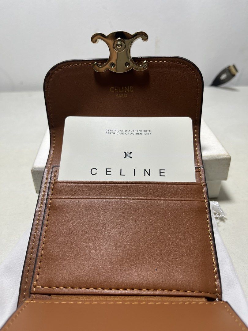 AUTHENTIC CELINE TRIOMPHE TRIFOLD WALLET (Category: Wallets & Card holders) located in Manila. Submitted by mslsown (Listing ID 1448824887, Image 2). Description: CELINE TRIOMPHE -used once -rfs: decluttering -inclusions: dust bag, box card of authenticity provided as seen in post.