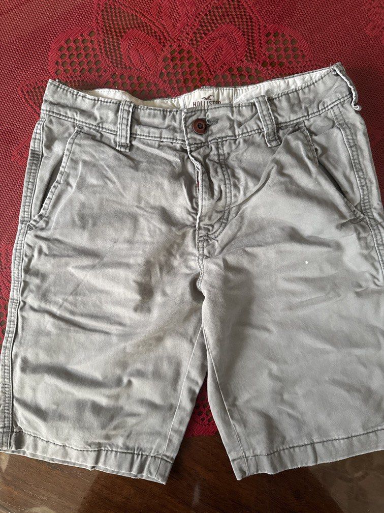 Authentic Hollister khaki shorts (grey) (Category: Shorts) located in Muntinlupa City. Submitted by itsprelovednow (Listing ID 1448700704, Image 1). Description: distressed fabric material but still in excellent condition except for a small white spot/stain.