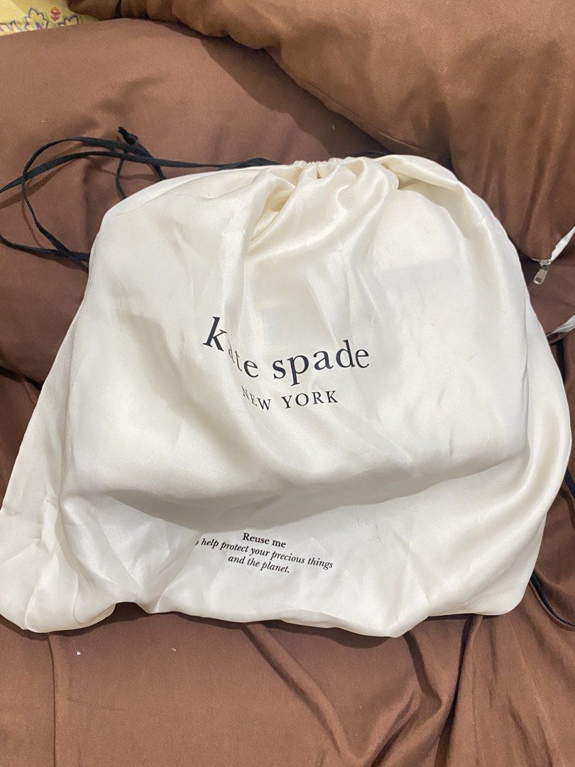 Authentic Kate Spade Medium Katy Top Handle Bag in Textured Leather (Category: Luxury Bags & Wallets) located in Manila. Submitted by hernarchangela (Listing ID 1448754894, Image 3). Description: - Bought for ₱23,000+ in 2023 - Original dust bag included - Excellent condition - Well-maintained and stored properly - RFS: Need extra funds and I don’t really use it anymore, it’s just been sitting in my closet..