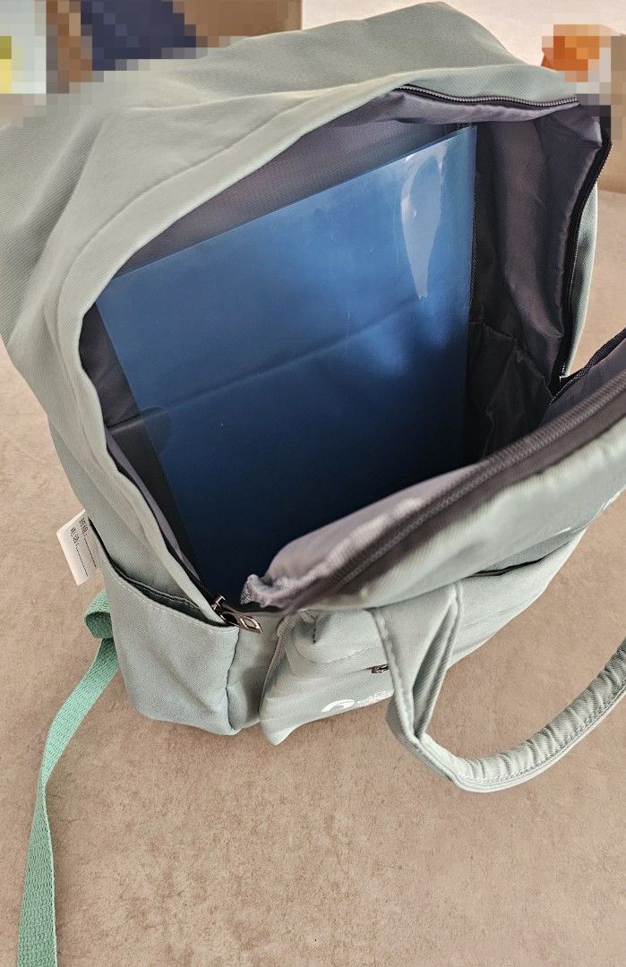 Backpack (Category: Stationery & School Supplies) located in Singapore. Submitted by yst1297 (Listing ID 1448716115, Image 3). Description: - Light green backpack from HCL Singapore - Commemorates HCL's 20th anniversary - Features a main compartment and a front pocket - Adjustable straps for a comfortable fit - Ideal for Enrichment class use. - 1 for $3, 2 for $5.