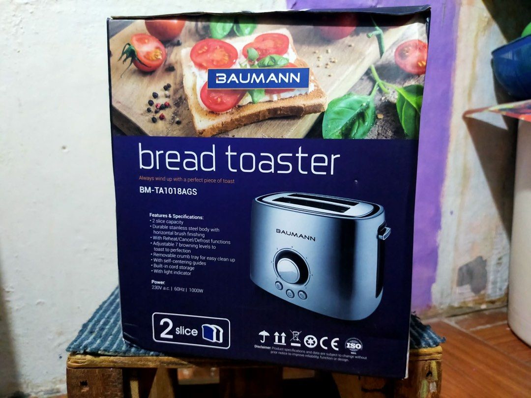 BAUMANN 2 Slice Bread Toaster BM-TA1018AGS Stainless Steel (Category: Ovens & Toasters) located in Bacoor. Submitted by swiftstar.b99627 (Listing ID 1448752759, Image 2). Description: - Baumann 2-slice bread toaster - Durable stainless steel body with horizontal brush finish - Adjustable browning levels (1-7) - Functions: Reheat, Cancel, Defrost - Removable crumb tray for easy cleaning - Light indicator and self-centering guides - Perfect additio