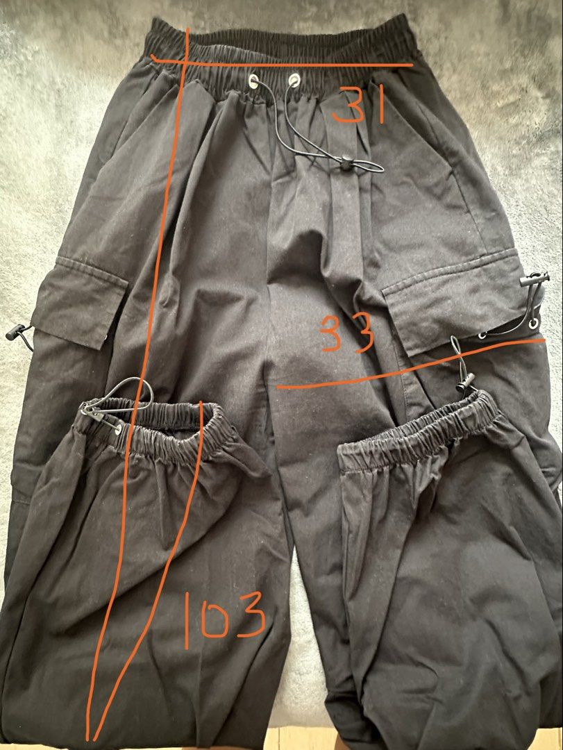 Black Cargo Pants with Drawstrings and Pockets (Category: Other Bottoms) located in Taguig. Submitted by stigmapanda (Listing ID 1448846553, Image 3). Description: - Classic black cargo pants - Comfortable elastic waistband with adjustable drawstring - Multiple practical side pockets - Adjustable drawstring at the ankle for a customized fit - Measurements: Waist 31 cm, Hip 33 cm, Length 103 cm - Ideal for everyday casual wear.