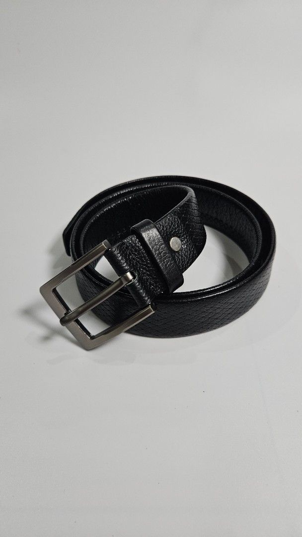 Black Leather Belt with Silver Buckle (Category: Belts) located in Alfonso. Submitted by jbcamet (Listing ID 1448834295, Image 1). Description: - Classic black leather belt - Textured leather finish - Modern silver-tone buckle - Simple and versatile design - Perfect for everyday wear - Fits most waist sizes.