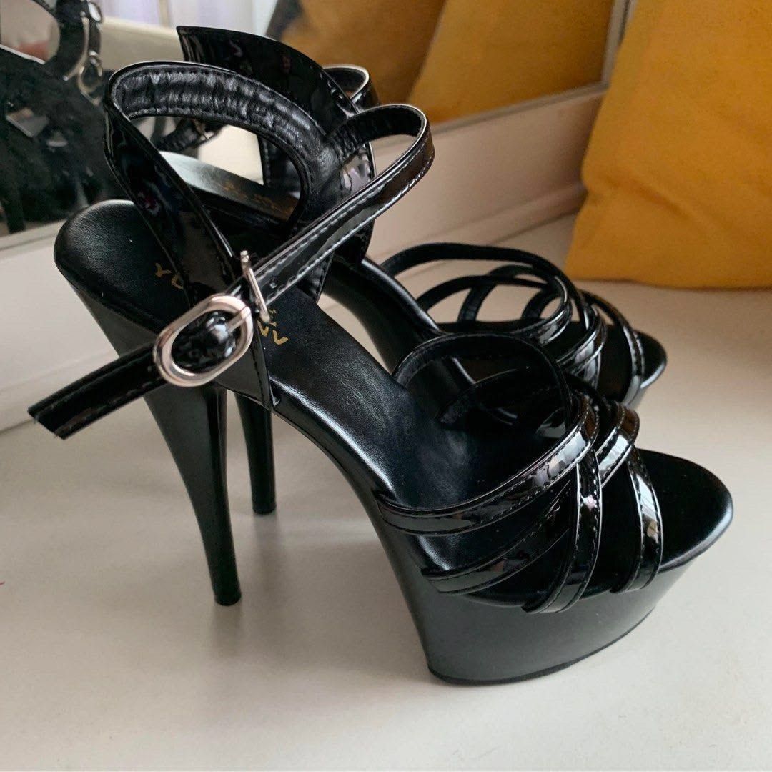 Black Patent Platform Stiletto Heels with Ankle Strap (Category: Heels) located in Kuala Lumpur. Submitted by theshopaholic.co (Listing ID 1448829485, Image 1). Description: - Black patent heels - High platform sole - Stiletto heel (approx. 6 inches) - Criss-cross front straps - Adjustable ankle strap - Ideal for parties and nights out - Makes a bold statement.