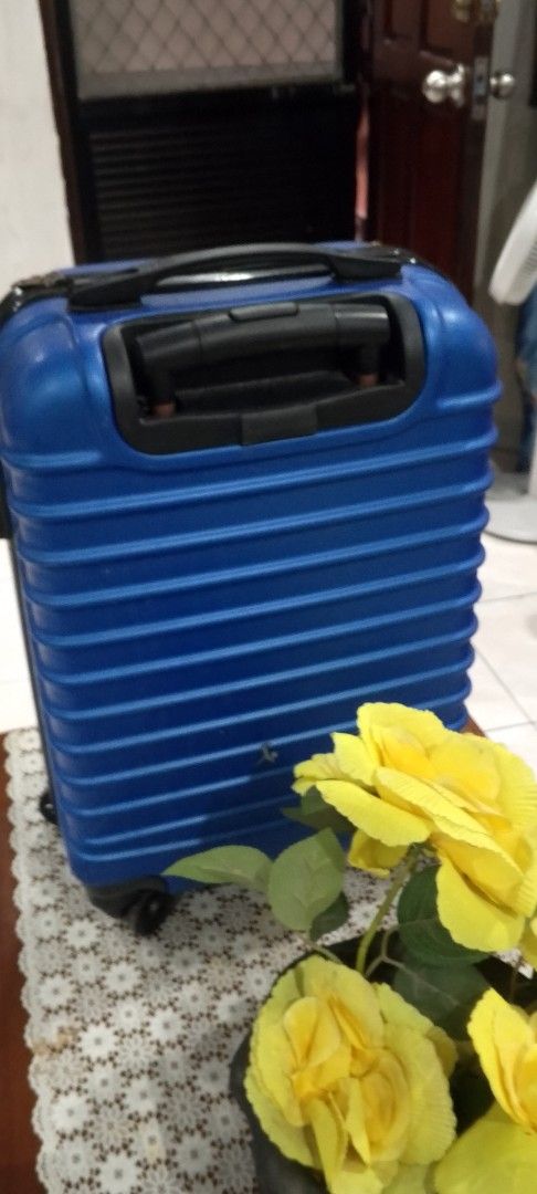 Blue Hardshell Spinner Luggage with TSA Lock (Category: Luggage) located in Caloocan City. Submitted by nobleflower_4c42cc (Listing ID 1448748115, Image 3). Description: - Blue hardshell suitcase - Built-in TSA lock for security - Four spinner wheels for easy maneuverability - Retractable handle - Perfect for your next adventure!.