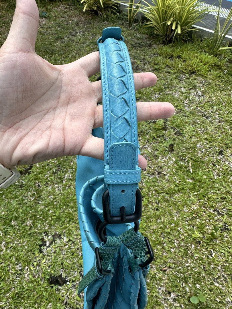 Bottega Veneta in turquoise blue (Category: Luxury Bags & Wallets) located in Rizal. Submitted by mj_arce (Listing ID 1448701139, Image 2). Description: BIG PRICE DROP! from 34,500 down to 26,500! - Stylish turquoise blue leather shoulder bag - Unique woven detail along the edges - Eye-catching python green snake skin accents on straps .