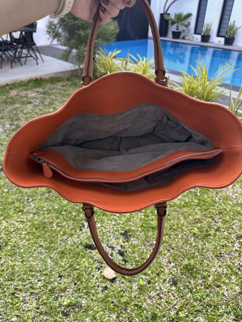Bottega Veneta Wavy Basket tote (Category: Luxury Bags & Wallets) located in Rizal. Submitted by mj_arce (Listing ID 1448699742, Image 2). Description: BIG PRICE DROP! from 38,500 down to 26,500!beautiful color combo no rubs/tears handles are in very good condition guaranteed authentic Bottega tote.